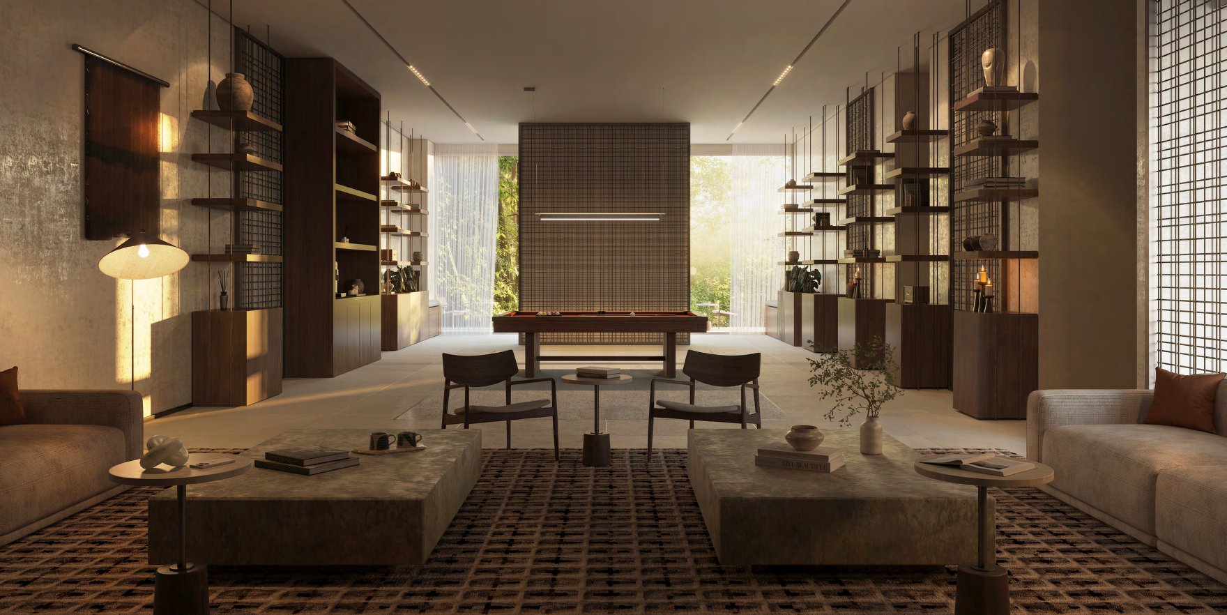 Library and gaming lounge with sofas, bookshelves and a billiard table