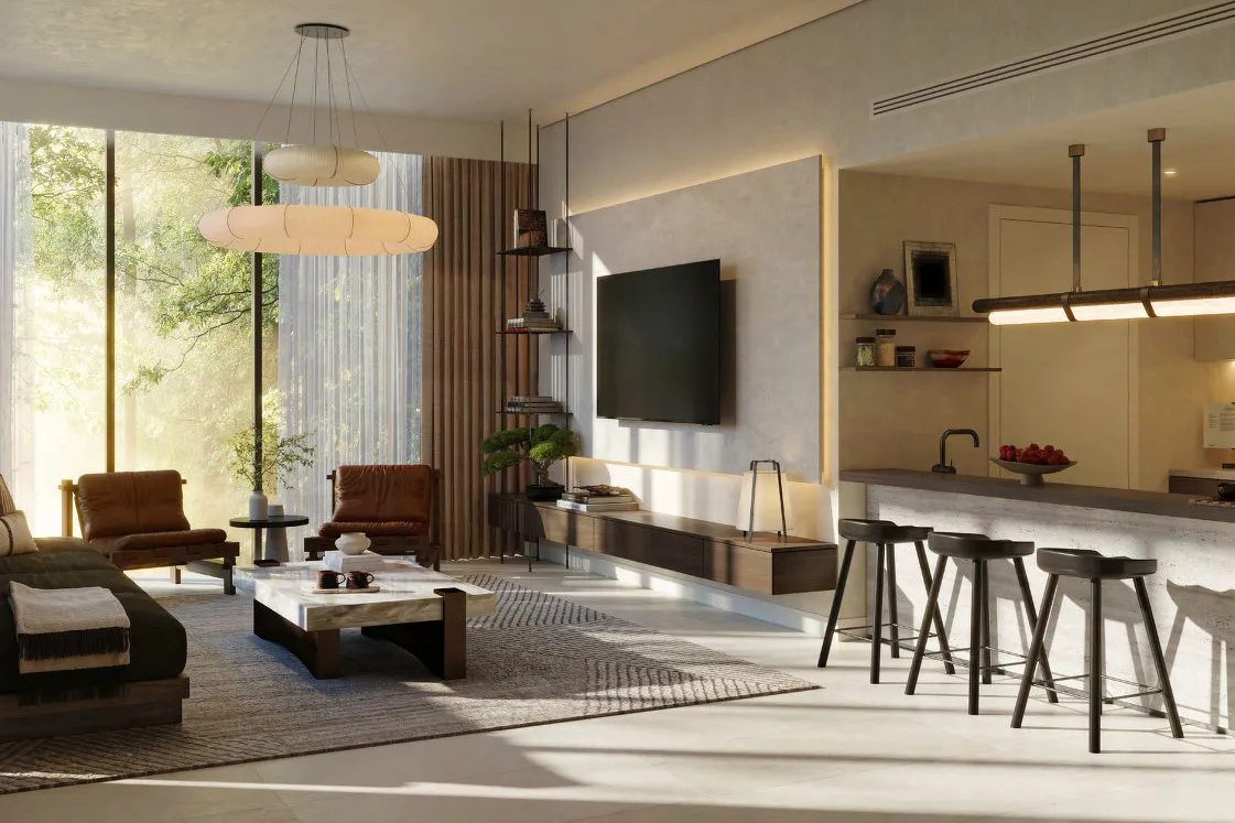 Apartment living area with open kitchen bar and tall windows onto trees